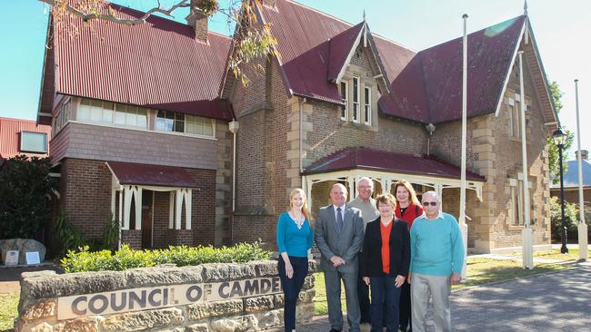 Mayor Lara Symkowiak with former councillor Greg Copeland, Gary Baker, Nola Tegel, Melissa Baker and Max Tegel at Camden’s historic Macaria building. Picture: Jess Husband.