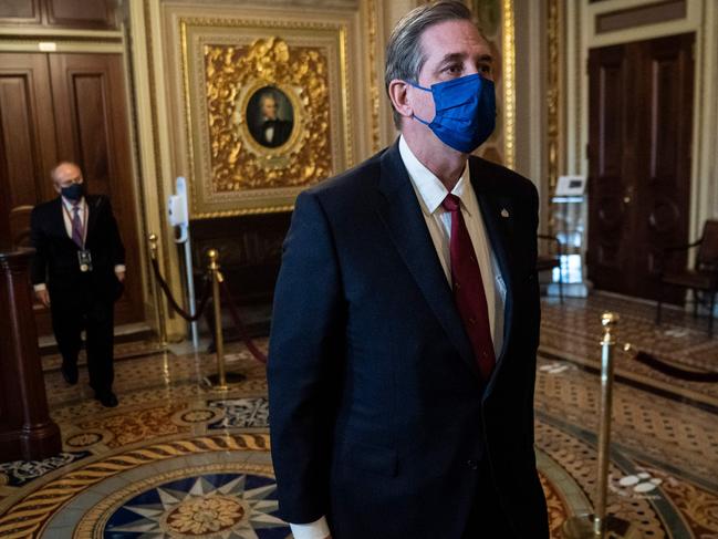 Bruce Castor walks to the Senate floor through the Senate Reception room. Picture: AFP.