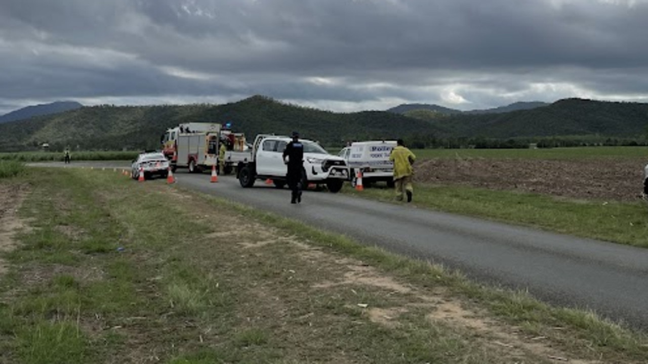 A driver has died after a cane truck rolled pinning him underneath on Gunyarra Rd at Andromache. Photo: Krystal Hender