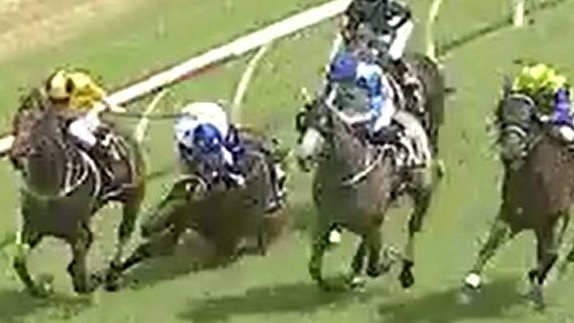 Three jockeys Emily Atkinson (So Super, white and blue silks), Luke Rolls (Cutting Loose, black and blue silks) and Tennille Gray (Baltic Cavalier, white silks) fell off their horses during race one at Clarence River Jockey Club in Grafton on Monday, 29th March, 2021.