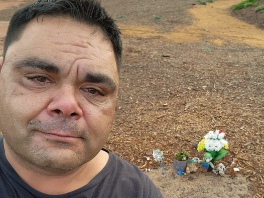 Shane Wanganeen at the gravesite  of his son  Makai Wanganeen at  Smithfield cemetery who  passed away , 7 years old  . Picture: Supplied