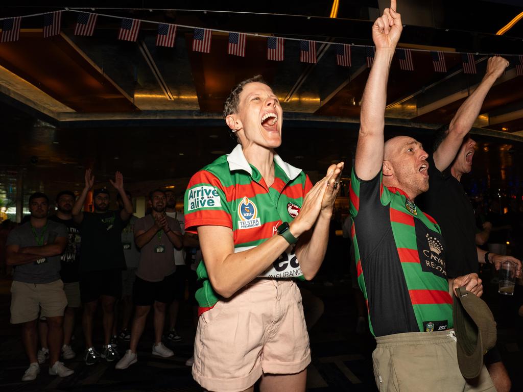 Rabbitohs fans Avril Chestnut and Brendan Doyle celebrate a try at the SuperCoach Viva Non-Vegas Party. Picture: Tom Parrish