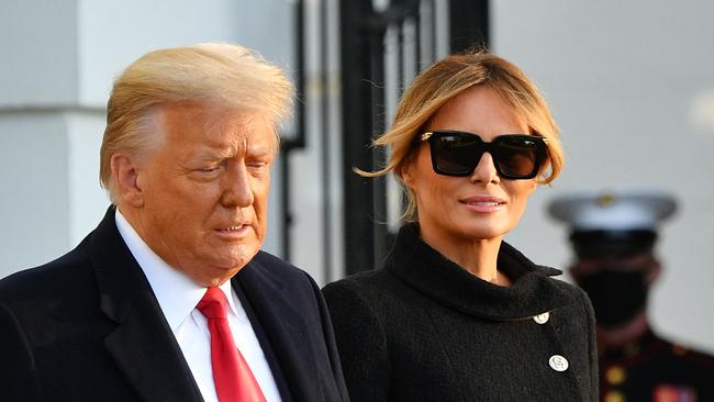 US President Donald Trump and First Lady Melania Trump. (Photo by MANDEL NGAN / AFP)