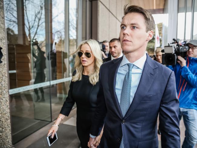 Jacenko and Curtis arrive at NSW Supreme Court for sentencing to his insider trading conviction last week. Picture: Craig Greenhill