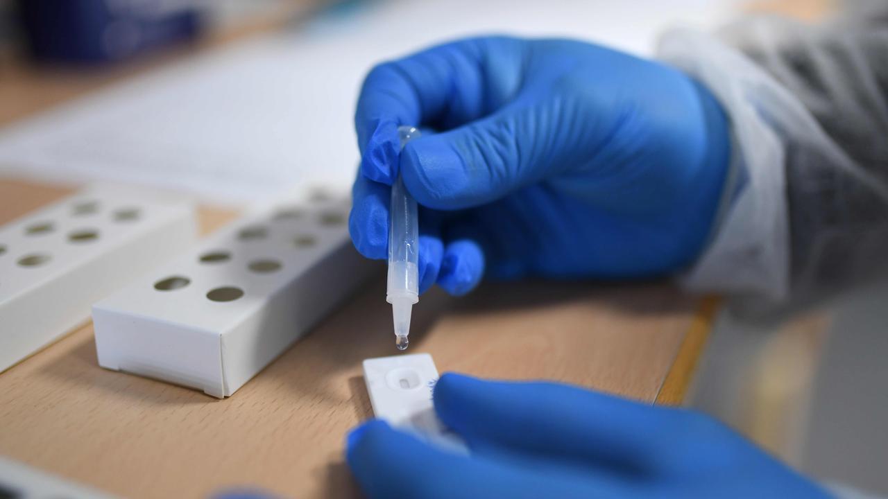 A rapid antigen test being used at a nursing home western Germany. Picture: Ina Fassbender/AFP