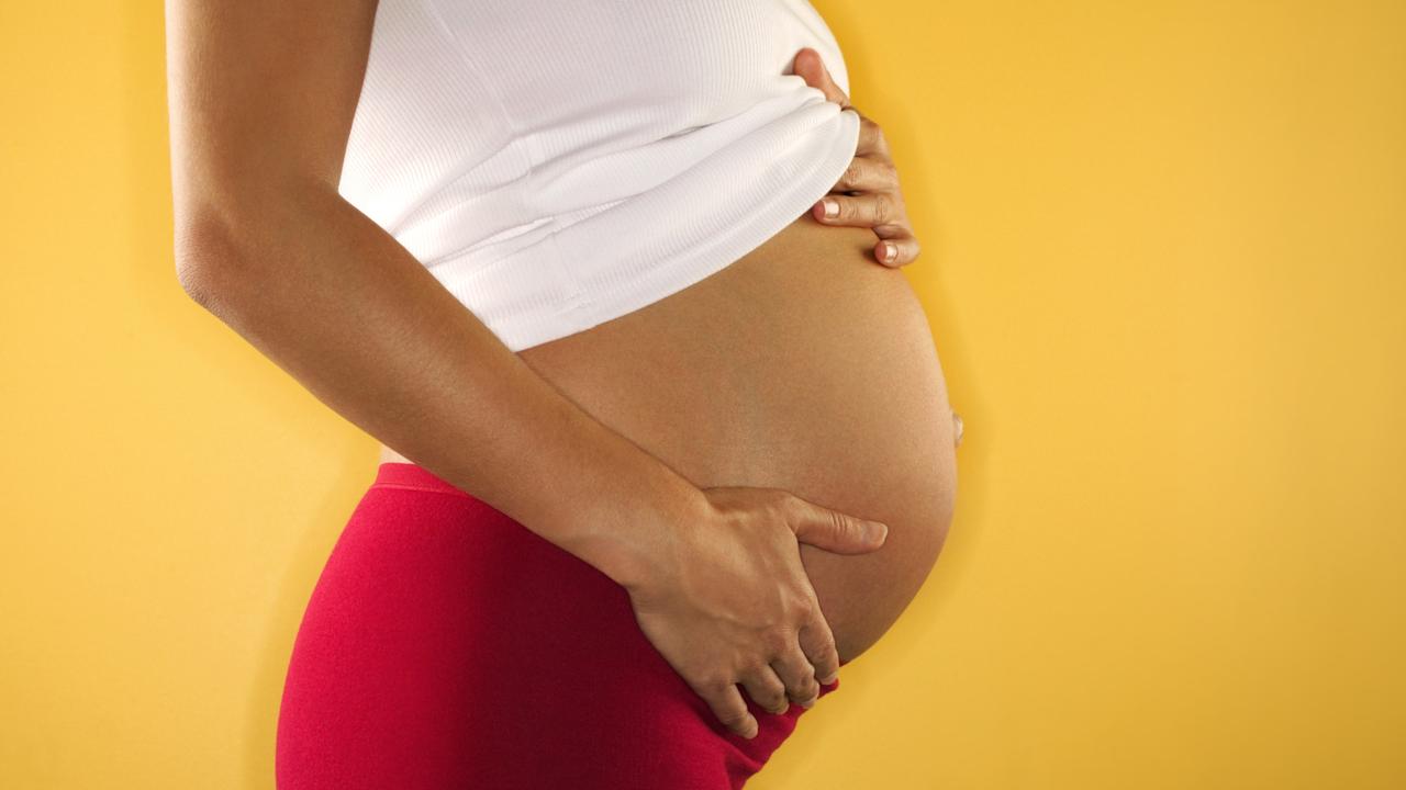 Generic image of the torso of a pregnant woman.