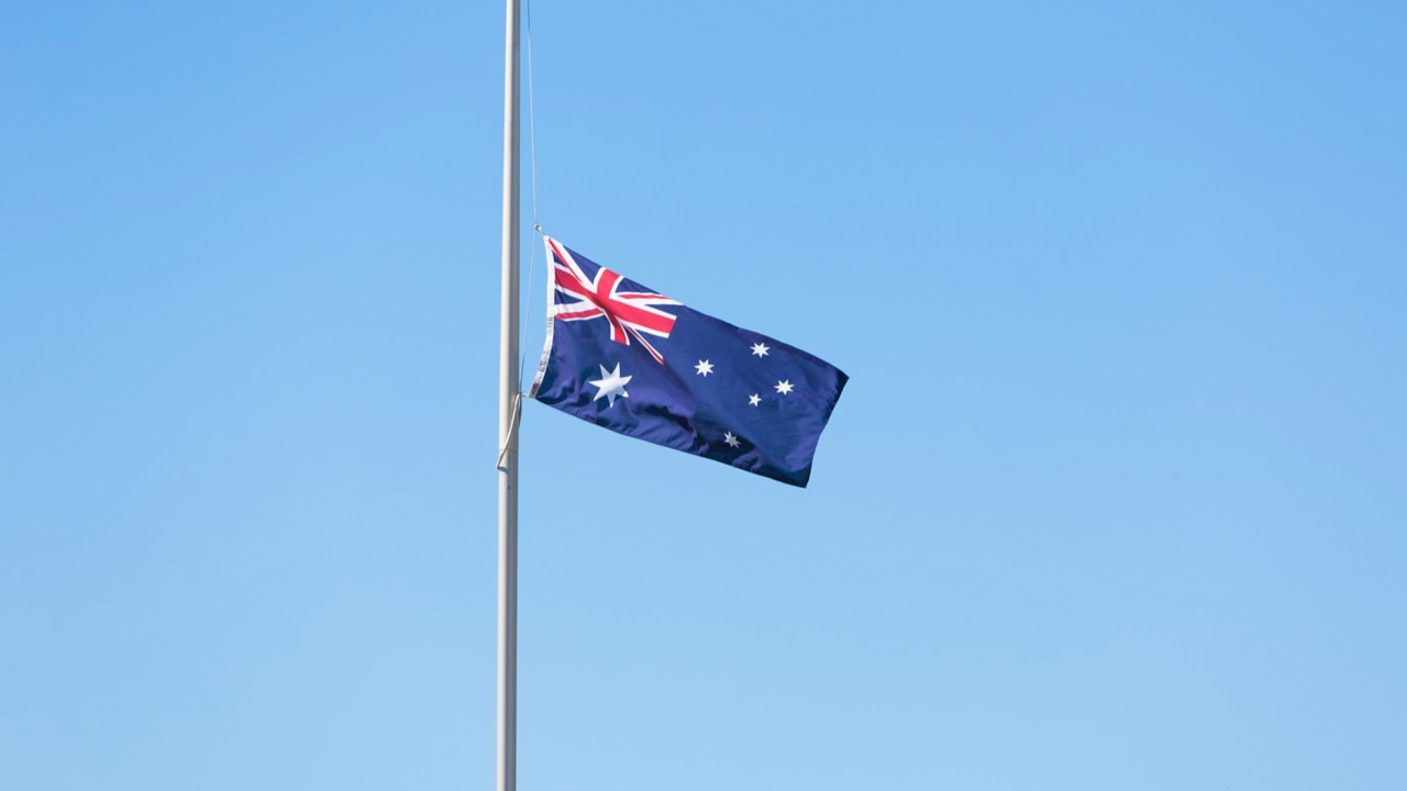 Australian flag flys at half-mast honouring the late Bill Hayden