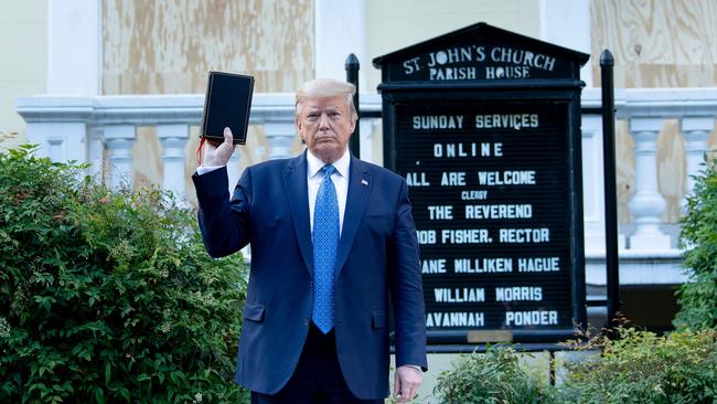 Donald Trump holds a Bible outside St John's Church in Washington on Tuesday. Picture: AFP