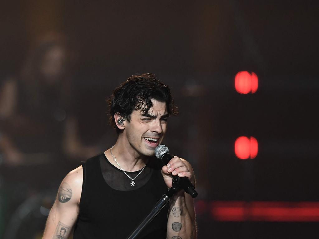 Joe Jonas, pictured in Las Vegas, choked up dedicating his song, “Little Bird”, during his Pennsylvania concert, the first since he was accused of ‘abducting’ kids. Picture: AFP