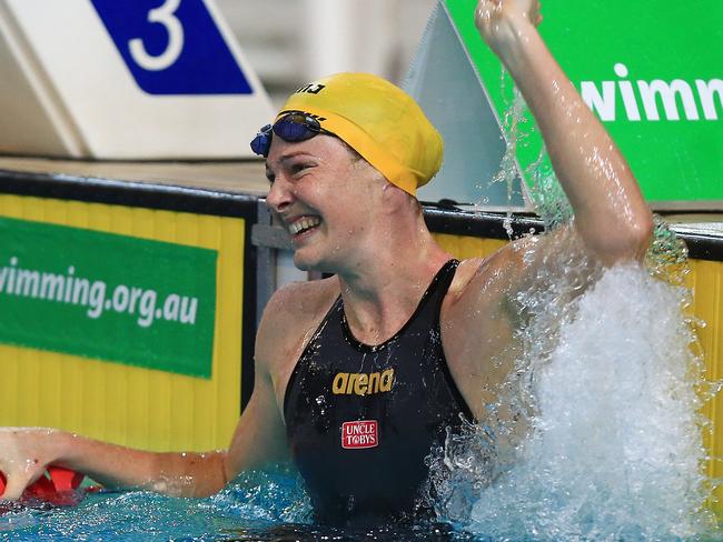 Cate Campbell celebrates after breaking the 100m freestyle world record.