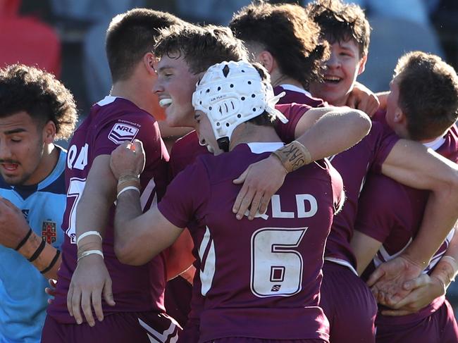 QLD celebrate after their win in the under 18 ASSRL schoolboy rugby league championship grand final between QLD v NSW CHS from Moreton Daily Stadium, Redcliffe.  Picture: Zak Simmonds