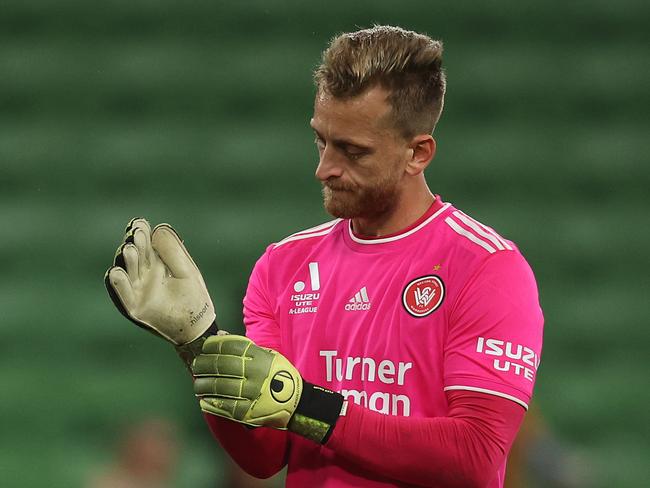 MELBOURNE, AUSTRALIA - MARCH 12: Wanderers goalkeeper Lawrence Thomas removes his gloves after the A-League Men round 12 match between Melbourne City and Western Sydney Wanderers at AAMI Park, on March 12, 2024, in Melbourne, Australia. (Photo by Daniel Pockett/Getty Images) (Photo by Daniel Pockett/Getty Images)