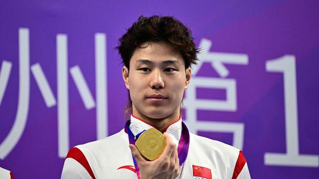 Qin Haiyang was the 2023 50m, 100m and 200m breaststroke world champion. Photo by Manan VATSYAYANA / AFP