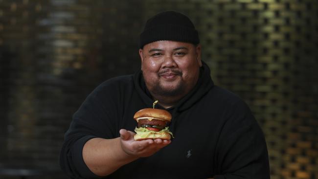 Eggslut founder and US celeb chef Alvin Cailan trying the new plant based burger from Alibi Bar and Kitchen at Ovolo Woolloomooloo. Picture: Justin Lloyd