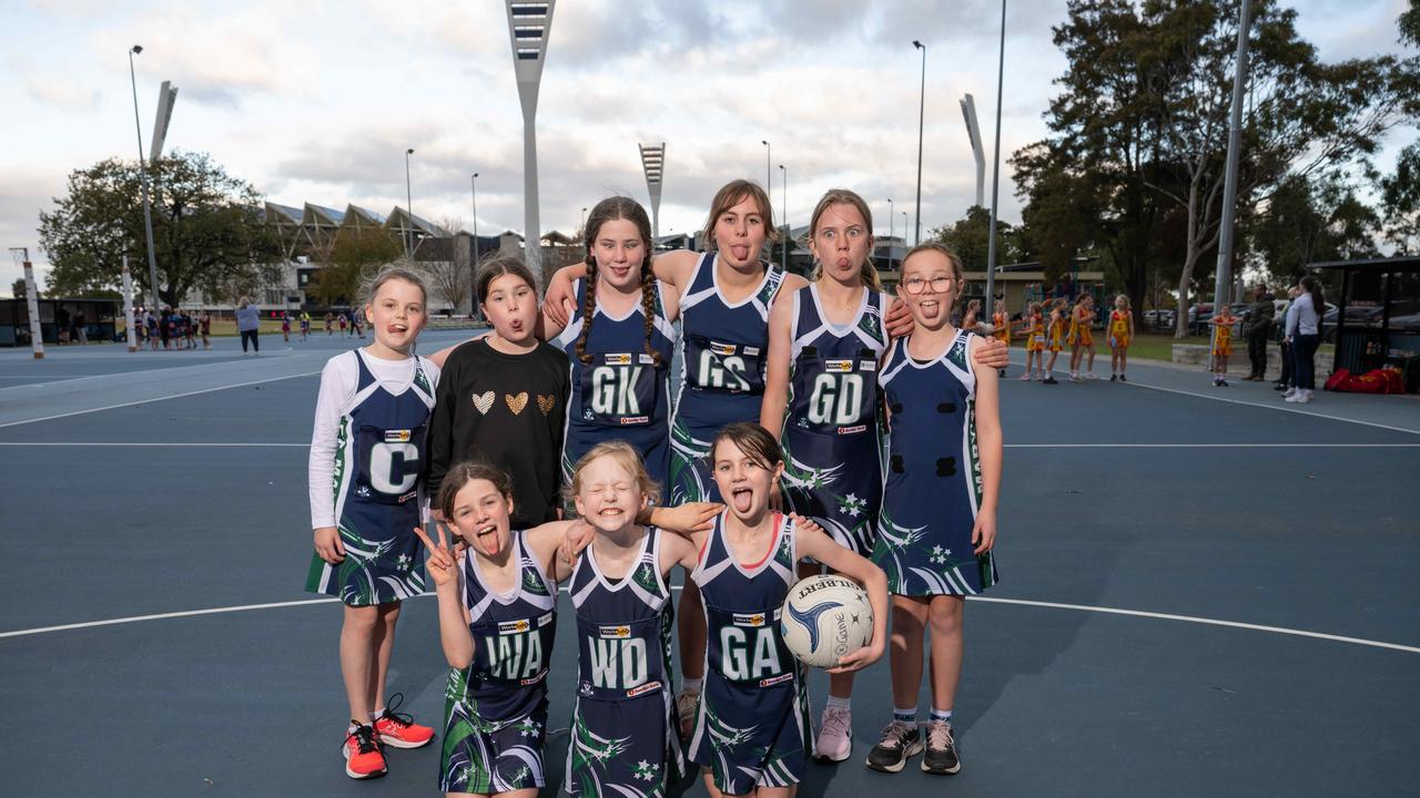 St Mary’s Dunstan under-11 netball team pull their funniest faces.