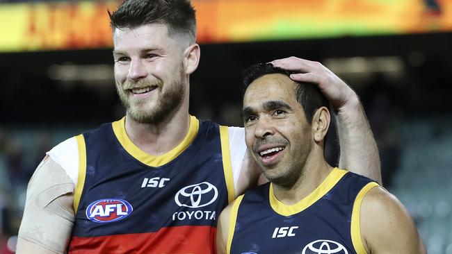 Adelaide’s Bryce Gibbs and Eddie Betts after the win. Picture: Sarah Reed