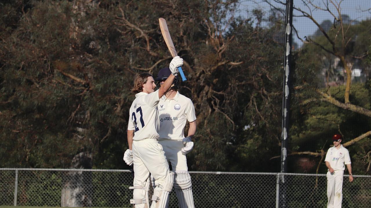 Lachie Field raises the bat for his 100 against Fitzroy Doncaster. Picture: Carey Neate