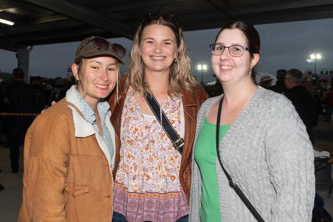 Sienna Mau, Maddy McCarthy, Tahlia Richardson from Airlie Beach at the PBR Bull Pit Bull Bash at Dittmann Bucking Bulls in Bloomsbury. August 27, 2022. Picture: Michaela Harlow