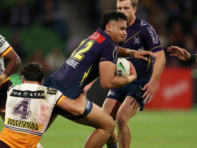 MELBOURNE, AUSTRALIA - MAY 11:  Eliesa Katoa of the Storm is tackled during the round 11 NRL match between Melbourne Storm and Brisbane Broncos at AAMI Park on May 11, 2023 in Melbourne, Australia. (Photo by Robert Cianflone/Getty Images)