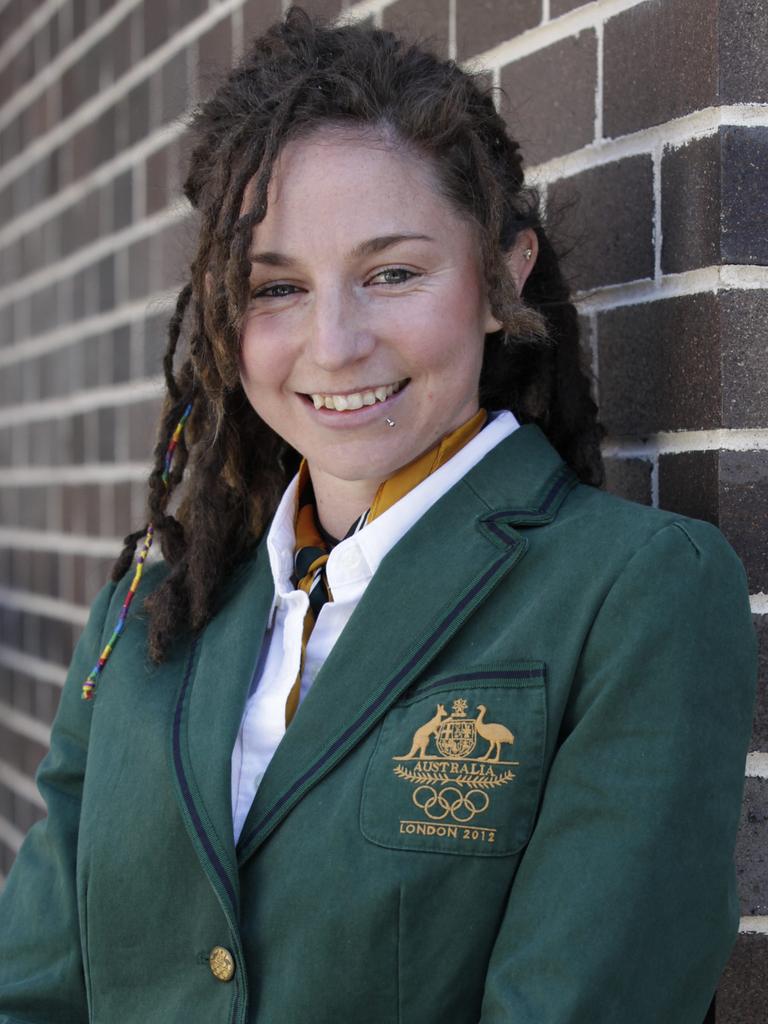 Olympian and Yuin woman Beki Smith is being coached by her eight-year-old son Lennon in how to play traditional Indigenous games, something she did not have an opportunity to do as a child.