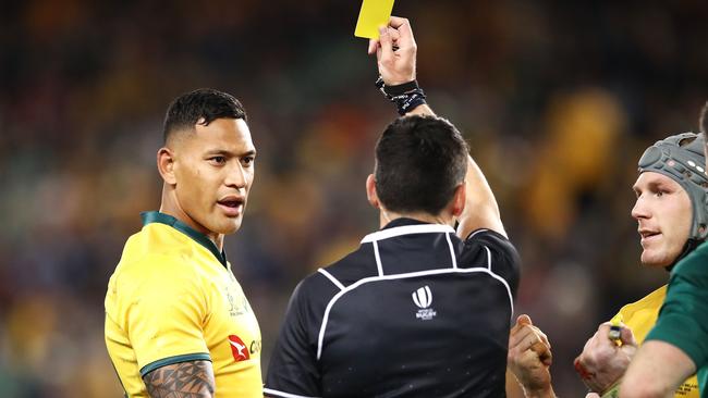 Israel Folau of the Wallabies is shown a yellow card by referee Pascal Gauzere.