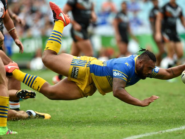 Junior Paulo of the Eels scores a try during the round 4 NRL match between the West Tigers and the Parramatta Eels at ANZ Stadium in Sydney on Monday, March 28, 2016. (AAP Image/Paul Miller) NO ARCHIVING, EDITORIAL USE ONLY