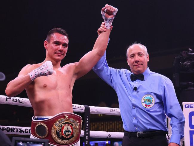 MINNEAPOLIS, MN - MARCH 26: Tim Tszyu (white with blue trunks) v Terrell Gausha (white with red and gold trunks) box in the Super Welterweight main event at the Armory on March 26, 2022 in Minneapolis, United States. Tszyu, in his USA debut defeated Gausha by judges decision. (Photo by Adam Bettcher/Getty Images)