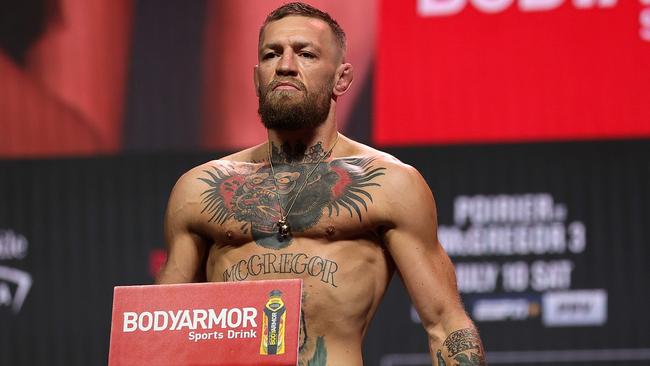 Conor McGregor poses during a ceremonial weigh in for UFC 264. Photo: Stacy Revere/Getty Images/AFP.