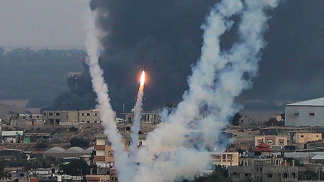 Palestinian militants fire rockets towards Israel from Rafah, southern Gaza Strip, on Wednesday. Picture: AFP