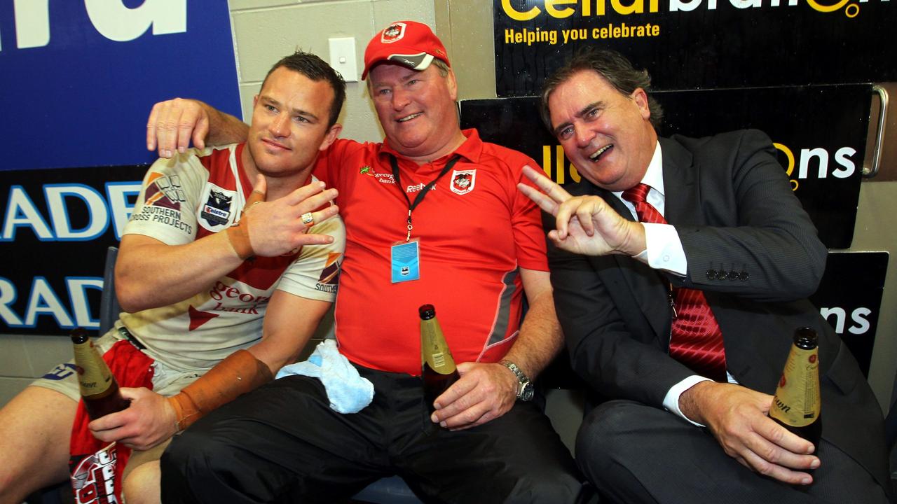 SPORT: 2010 NRL Grand Final at Sydney Olympic Park between Sydney City Roosters and St George Illawarra Dragons. L to R, Dragons hooker Dean Young with father Craig and St George Illawarra chiel executive Peter Doust.