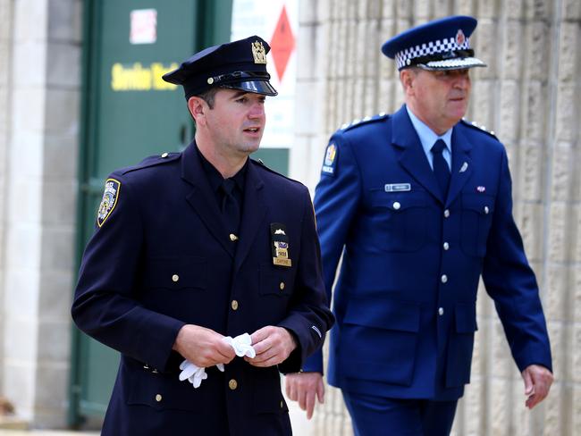 Mourners at the memorial service with full police honours for constables Rachel McCrow and Matthew Arnold at Brisbane Entertainment Centre. Picture: David Clark