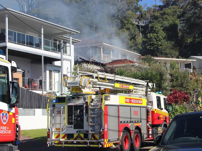 Fire and Rescue NSW crews on scene at a house fire on Miller Rd.