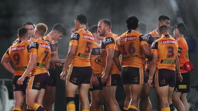 Dejected Brisbane players yet another loss. Picture: Brett Costello