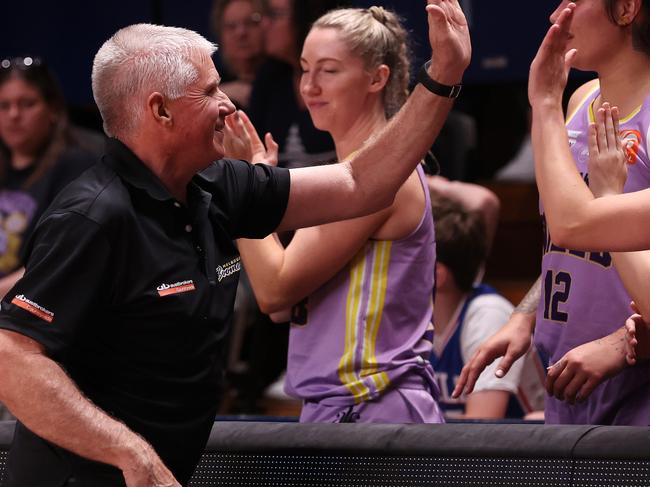 ADELAIDE, AUSTRALIA - NOVEMBER 01: Chris Lucas, head coach of the Melbourne Boomers with Sherrie Calleia of the Melbourne Boomers after the win during the WNBL match between Adelaide Lightning and Melbourne Boomers at Adelaide Arena, on November 01, 2023, in Adelaide, Australia. (Photo by Sarah Reed/Getty Images)