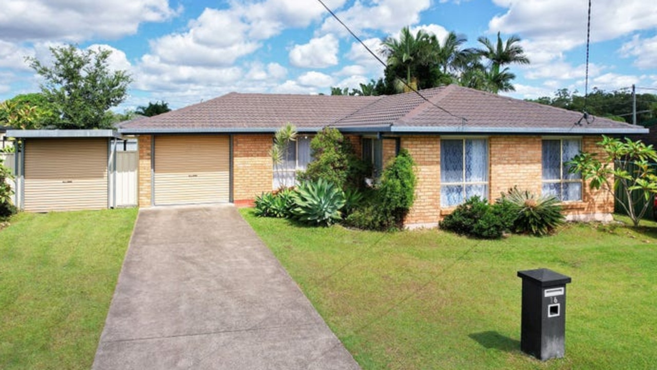 This four-bedroom house at 16 Lycoris St, Crestmead, is on the market for offers over $699,000m, with 'price reduced, must be sold'