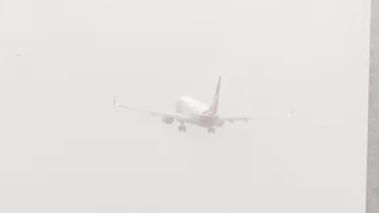 Watch: Qantas plane’s wild aborted landing during paradise deluge