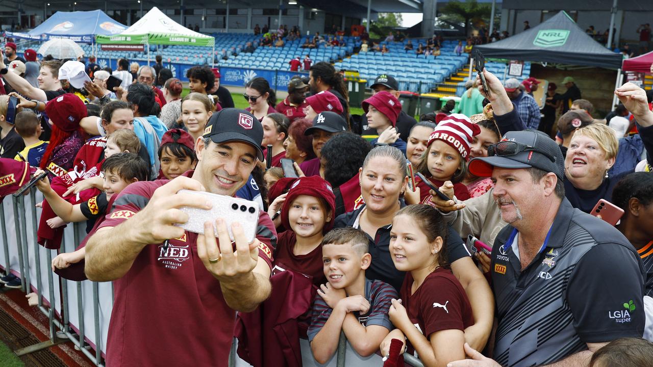 Billy Slater takes selfies with Jenna Hincksmam and her children at a fan day. Picture: Brendan Radke