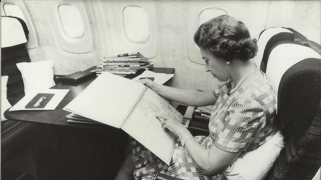 Queen Elizabeth II flying on a Concorde trans-Atlantic flight in 1977.