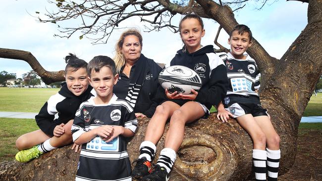 Sherri Longbottom with members of the under 8s (from left) Tallis Danks, Cadel Walters, Codi Ryan-Last, Cadel Walters and Robert Stanley at Rowland Park. Picture: Danny Aarons.