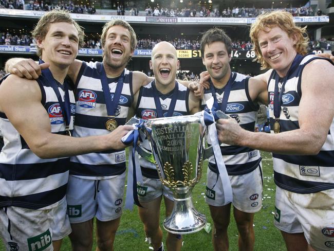 Joel Selwood, Joel Corey, Gary Ablett, Jimmy Bartel and Cameron Ling celebrate the club’s second flag in three years.