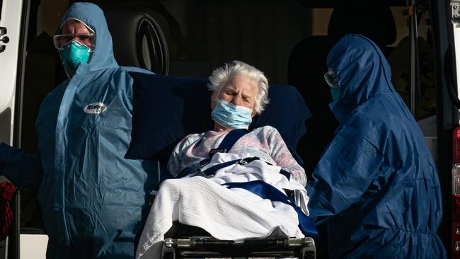 A resident is removed from St Basil’s Home for the Aged. Picture: Jason Edwards