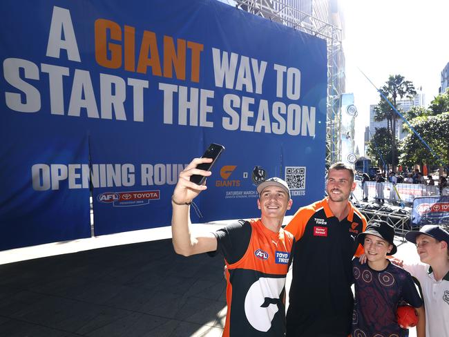 Ruckman Kieren Briggs takes a selfie with Giants fans at Parramatta Square. Picture: Phil Hillyard