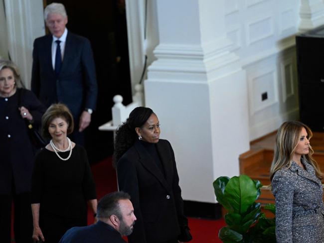 Melania Trump keeps her distance from other first ladies at the funeral for former president Jimmy Carter’s wife Rosalynn. Picture: Andrew Caballero-Reynolds (AFP)