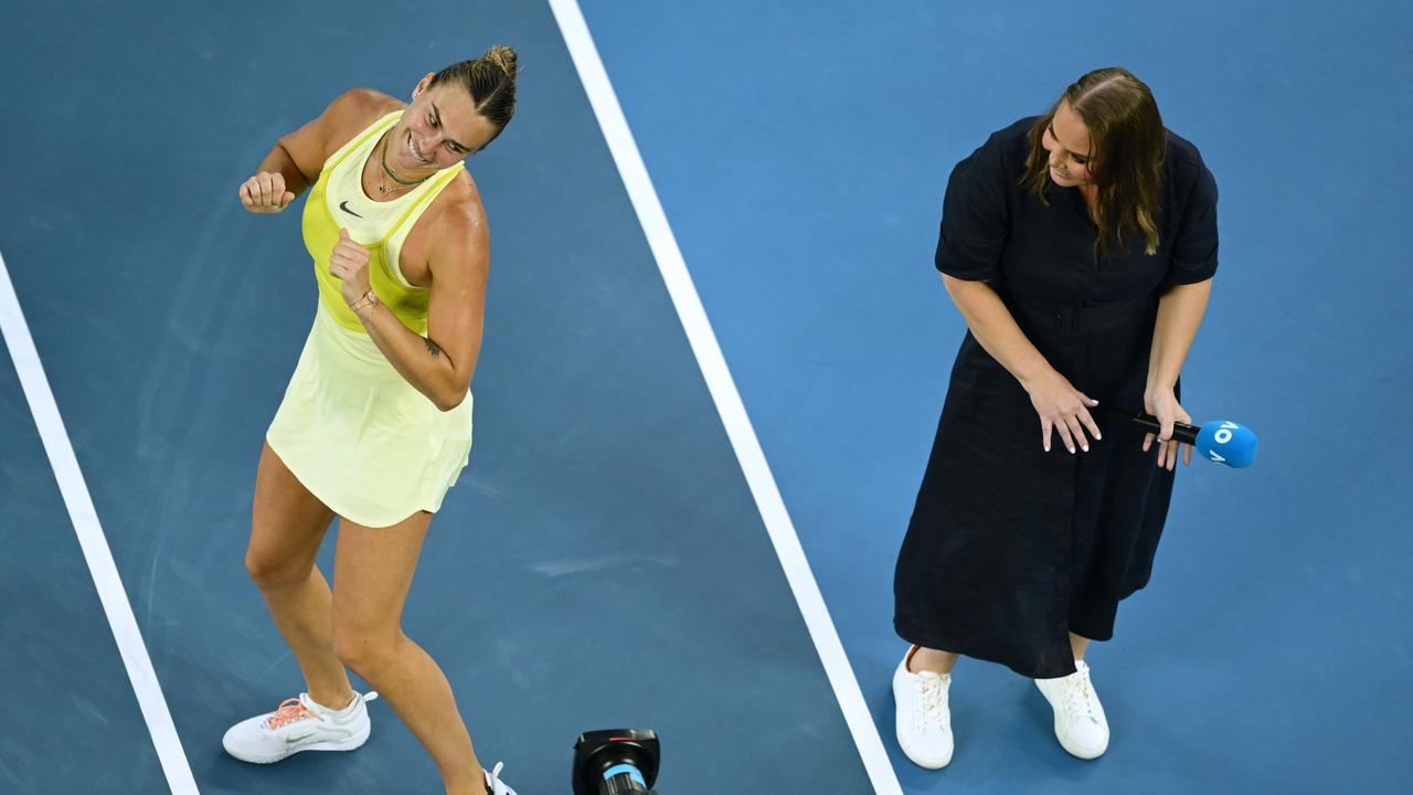 Aryna Sabalenka celebrates victory with on-court presenter Jelena Dokic following her first round match. (Photo by Hannah Peters/Getty Images)