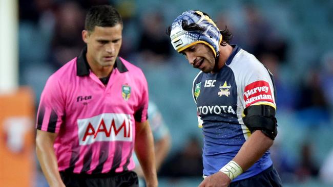 Cowboy's Johnathan Thurston and referee Henry Pernara.