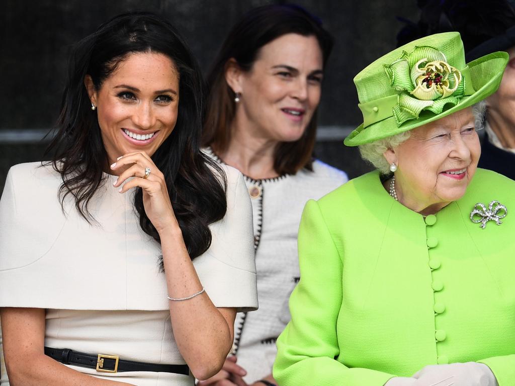 Samantha Cohen seen behind Meghan and the Queen in June 2018. Picture: Jeff J Mitchell/Getty Images.