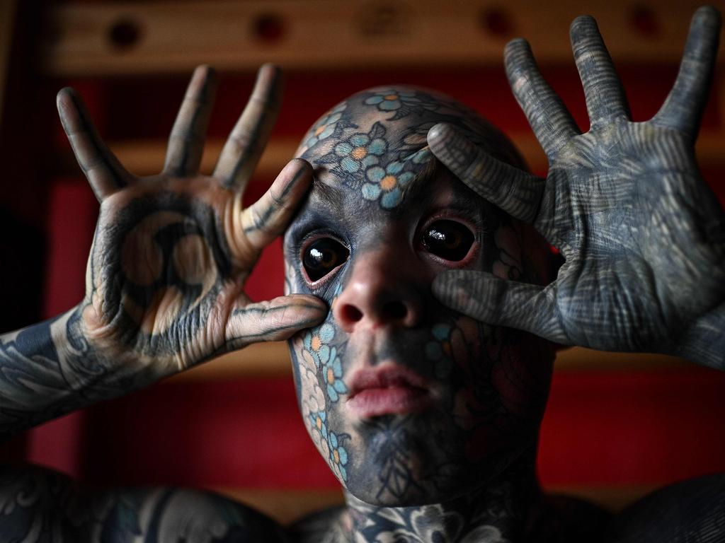 French primary school teacher and tattoo enthusiast Sylvain Helaine has had his eyeballs tattooed black. Picture: Christophe Archambault/AFP