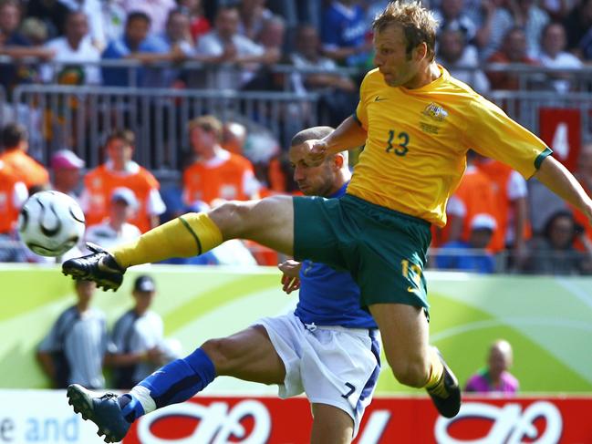 Sooceroos Vince Grella (R) vies with Italian forward Alessandro Del Piero during Australia v Italy Round of 16 2006 World Cup football match at Fritz Walter Stadium in Kaiserslautern, Germany.