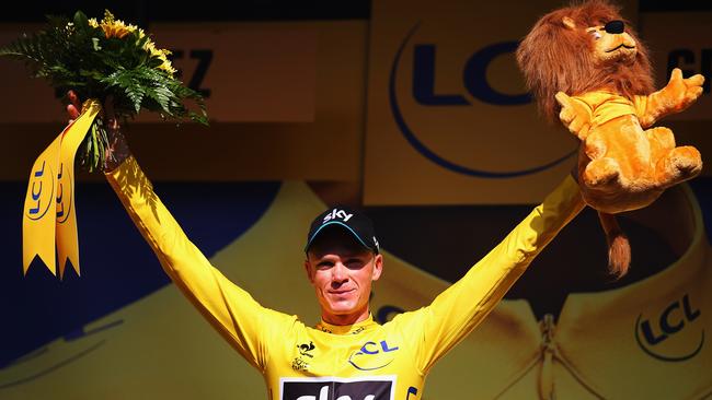 RODEZ, FRANCE - JULY 17: Chris Froome of Great Britain and Team Sky celebrates after retaining the overall leader's yellow jersey after stage thirteen of the 2015 Tour de France, a 198.5 km stage between Muret and Rodez, on July 17, 2015 in Rodez, France. (Photo by Bryn Lennon/Getty Images)