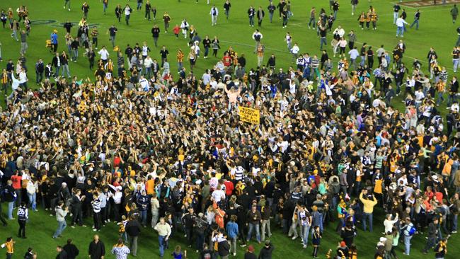 Fans invade the ground to celebrating Lance' Franklin’s 100th goal in 2008.